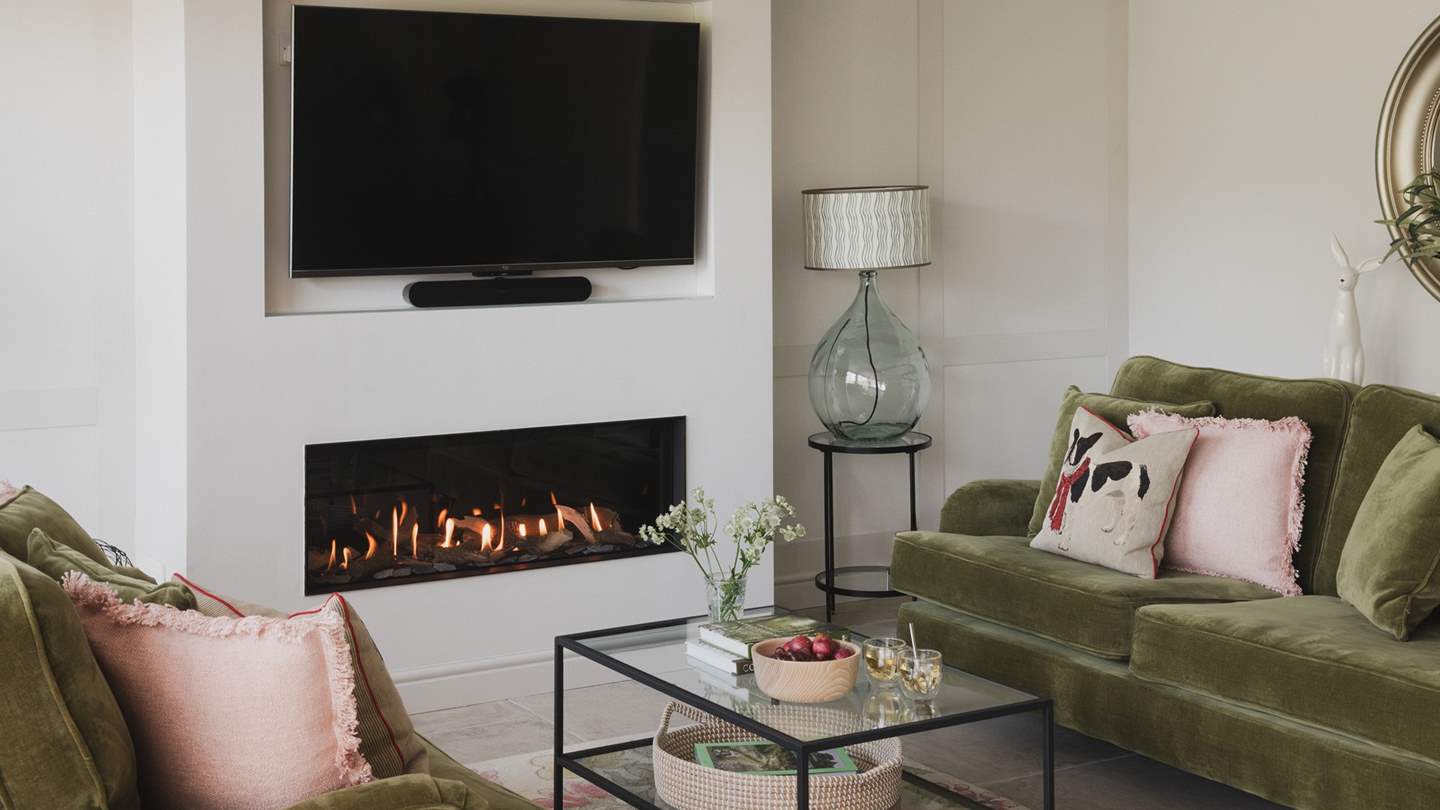 Centred around a flickering feature fireplace
