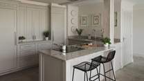 Two barstools rest on the island, creating a sociable setting for relaxed meal preparation
