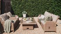 Step outside to uncover a secluded gravelled courtyard