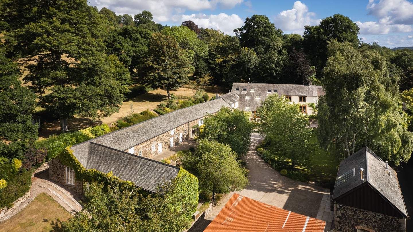 The courtyard is shared with Buddle Barn, a retreat sleeping four set across the courtyard