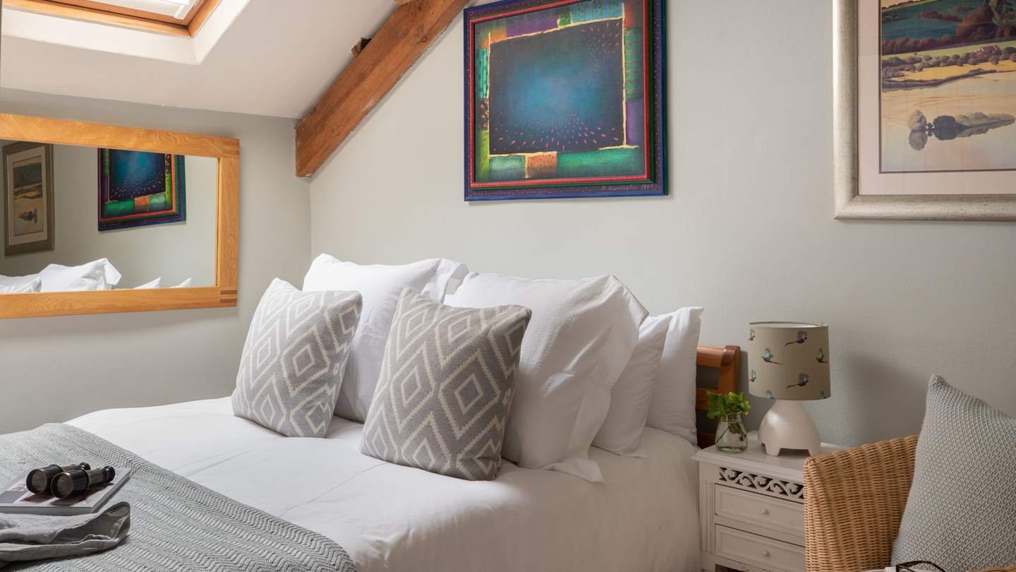 Uncover sun-brushed views over the leafy canopies beyond the window