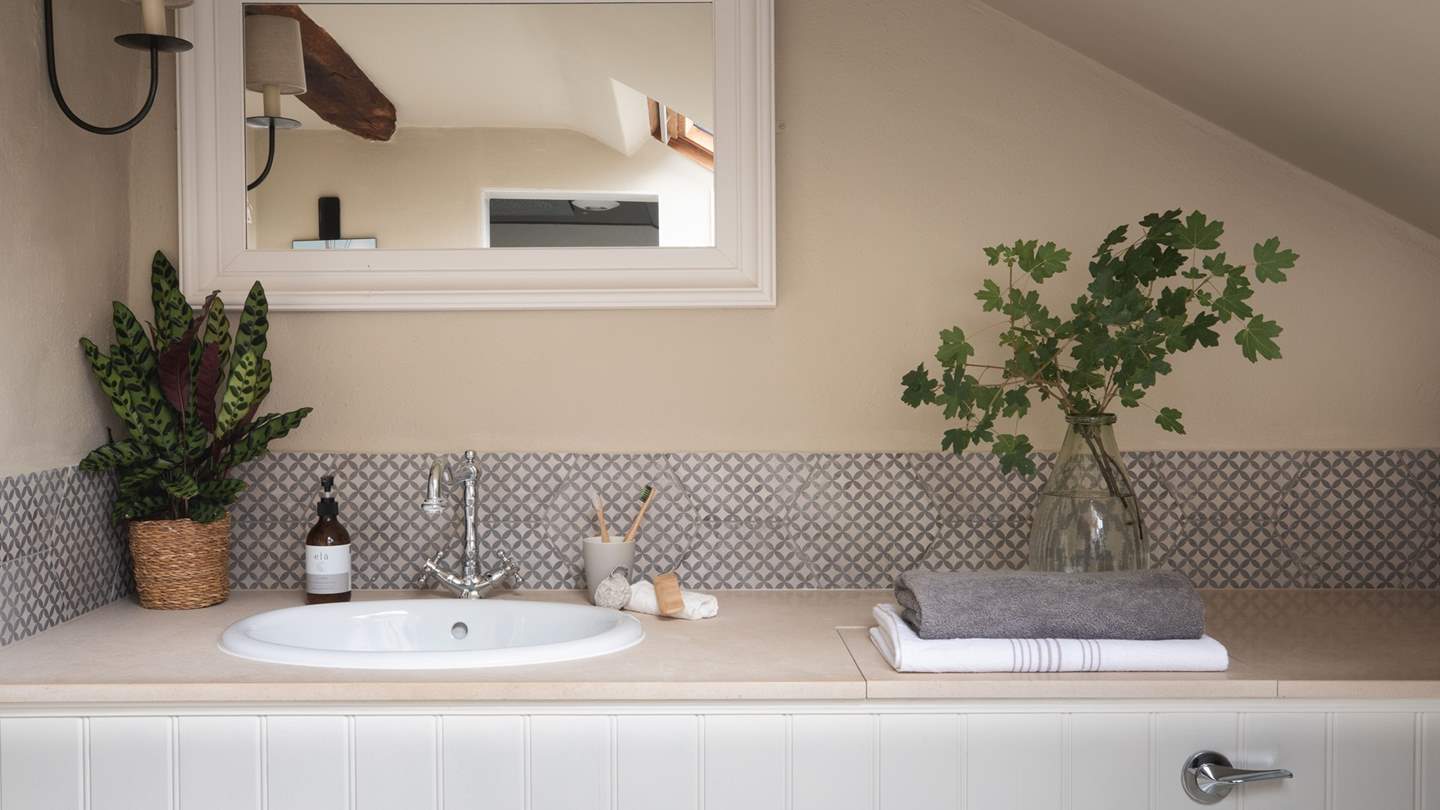 Walnut, Cherry, and Holly share a bathroom with a shower and also a bath for bubble-topped soaks