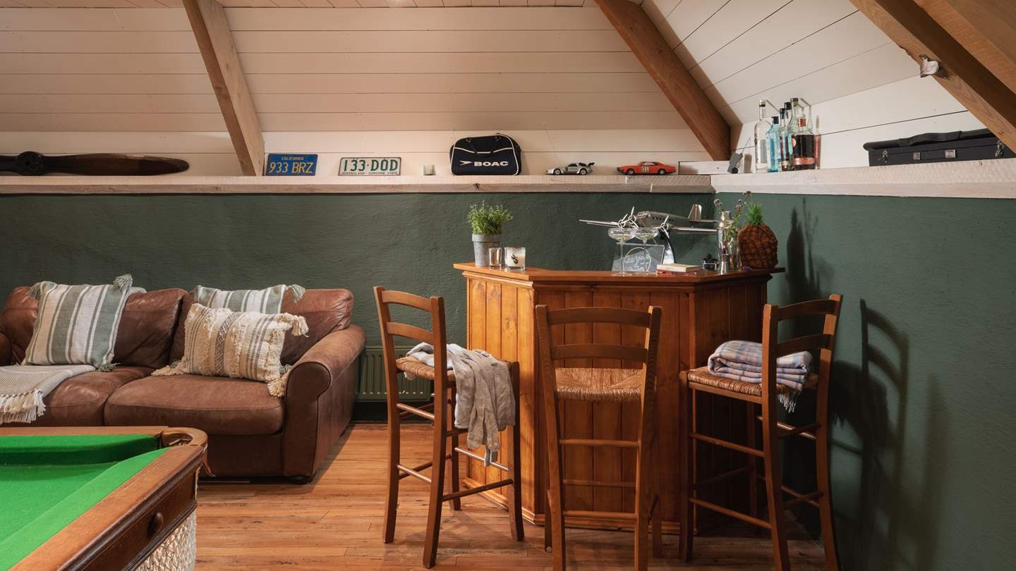 For grown-ups, comfortable sofas, a bar, and beer-fridge await for cosy evenings