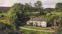 Perfectly set amidst emerald valley scenes, on the edge of the Cambrian Mountains...