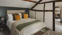 Follow the replica kite-winding staircase to uncover two equally beautiful bedroom spaces