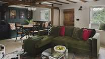 Settle on the L-shaped sofa and cow-print lounge chair to while away heavenly hours by fireside embers