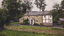 Uncover the ivy-woven façade of our storybook cottage