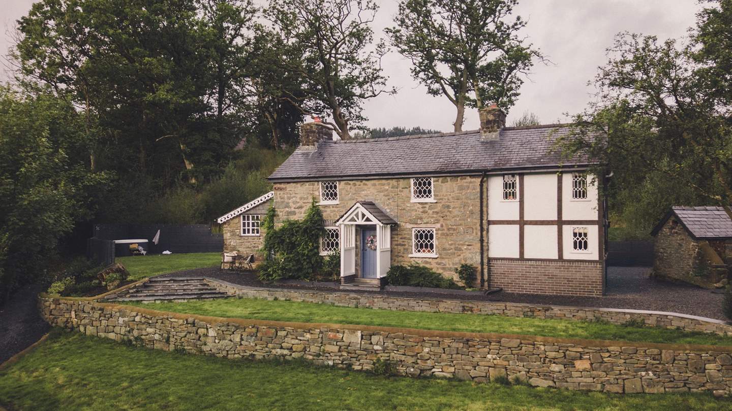 Uncover the ivy-woven façade of our storybook cottage