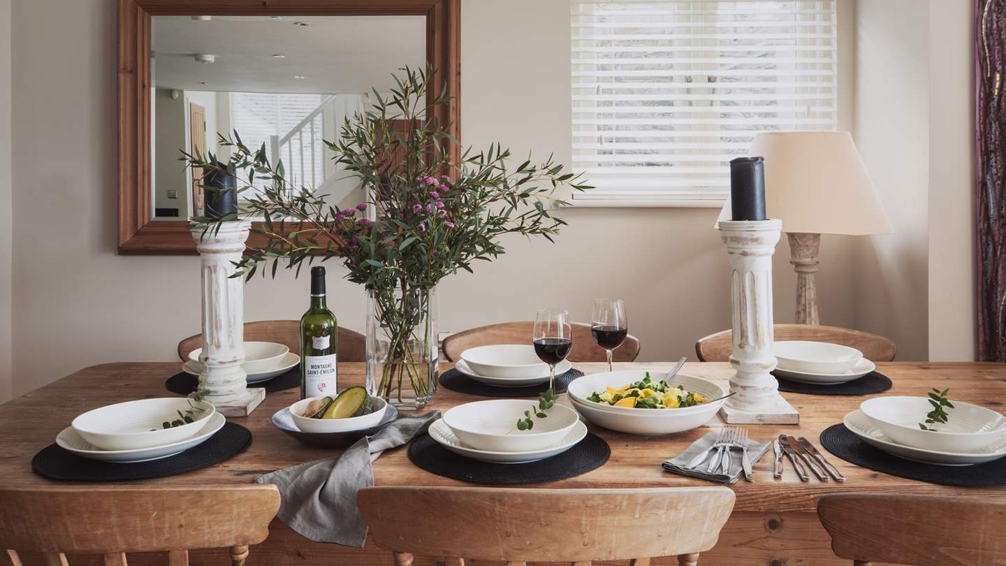 Adjoining the lounge, the open-plan kitchen and dining area proposes a wonderful space for savouring homemade meals