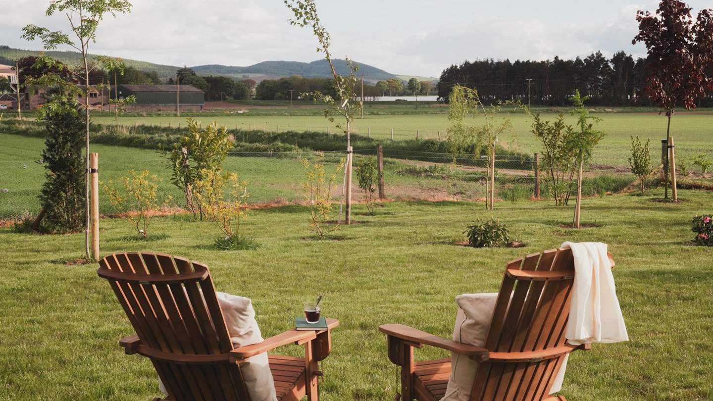 Sit back and admire the views from the wooden chairs