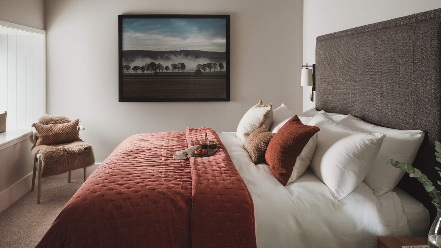 Embrace heavenly lie-ins, gazing at the verdant views beyond the window