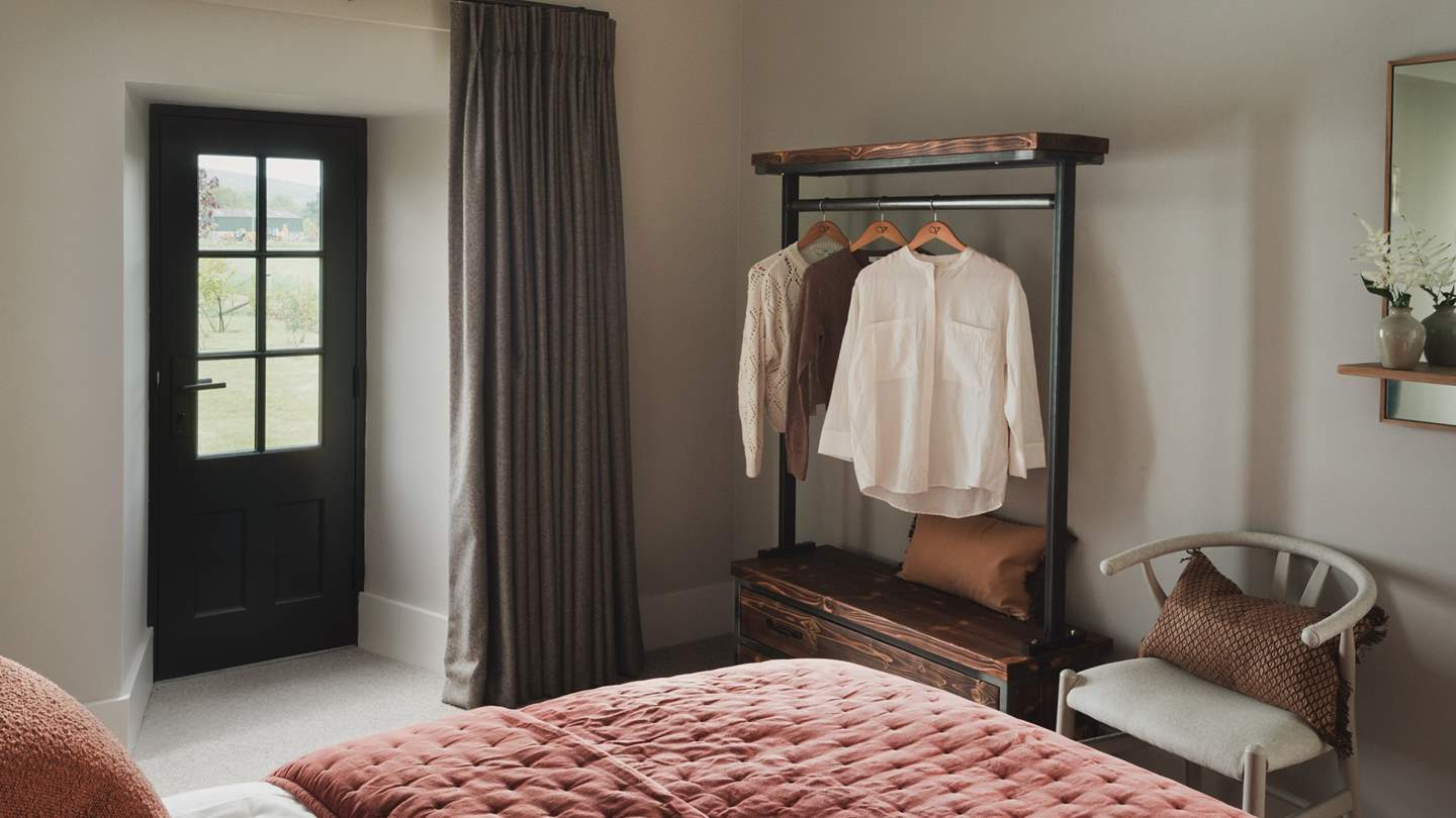 A super king bed is dressed in the finest linens