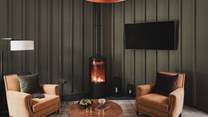Gather around the wood burner-effect gas stove