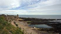 To the seaside charm of St Andrews in the south