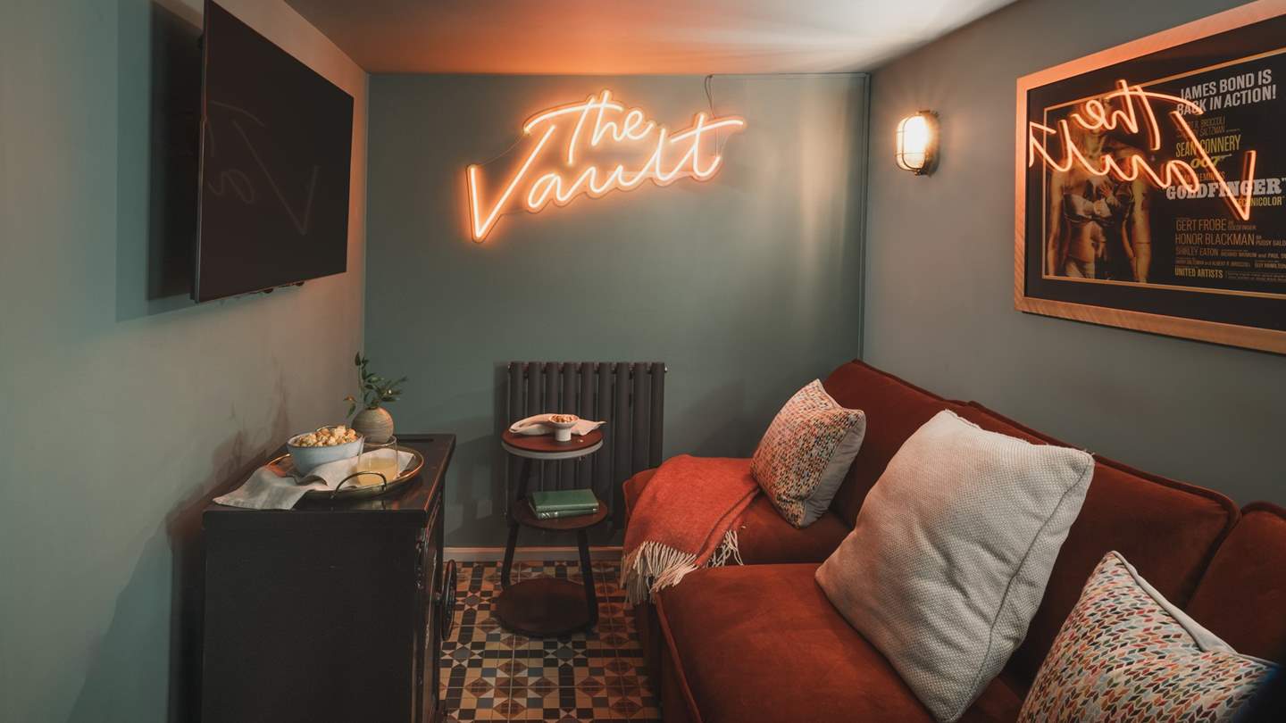 Uncover the former bank vault, a cosy space transformed into an atmospheric cinema room 