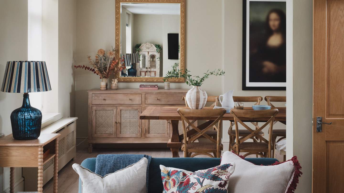 Residing on the first floor, the open-plan kitchen and dining room flow from the living area 