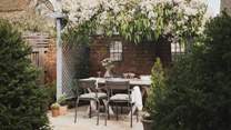 Uncover the sheltered courtyard garden of Bank House