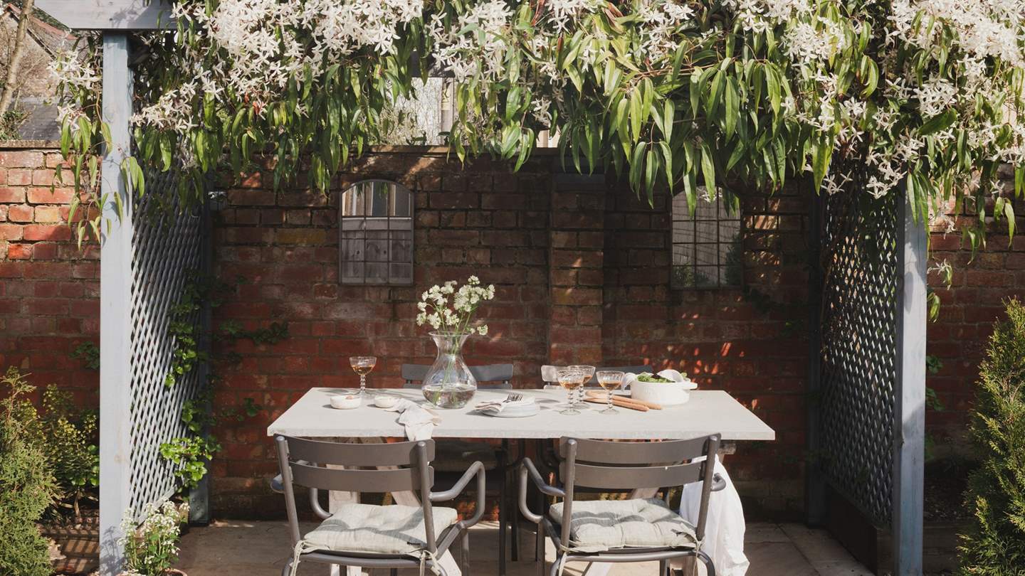 With seating for four, this is the perfect spot to sit in dappled sunshine 