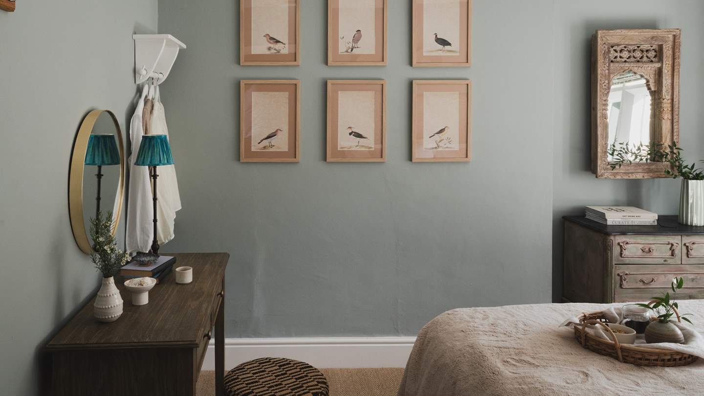 Irresistible for serene slumber, the first bedroom nestles within the eaves and features a sumptuous super king zip-and-link bed 