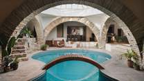 For added enjoyment, a selection of pool floats and toys are provided
