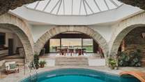 Thoughtfully layered living and dining spaces each frame a unique outlook across the magnificent moorland