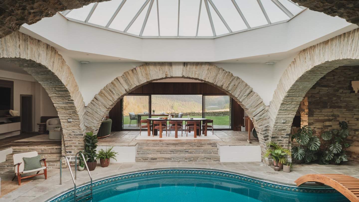Thoughtfully layered living and dining spaces each frame a unique outlook across the magnificent moorland