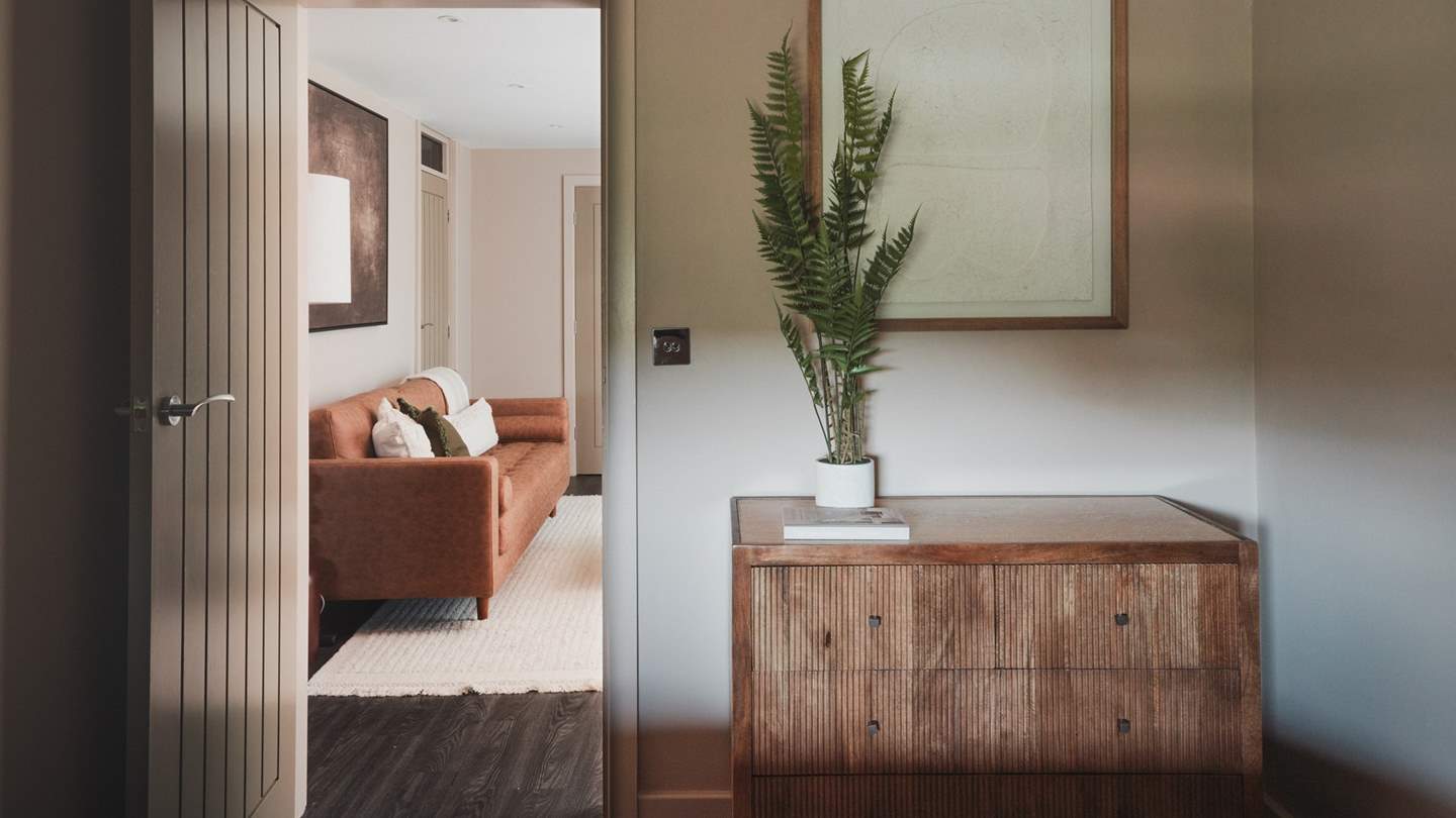 For stowing belongings, you'll find a chest of drawers 