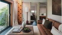 An additional living space awaits to the rear of the retreat beside the third and fourth bedrooms 