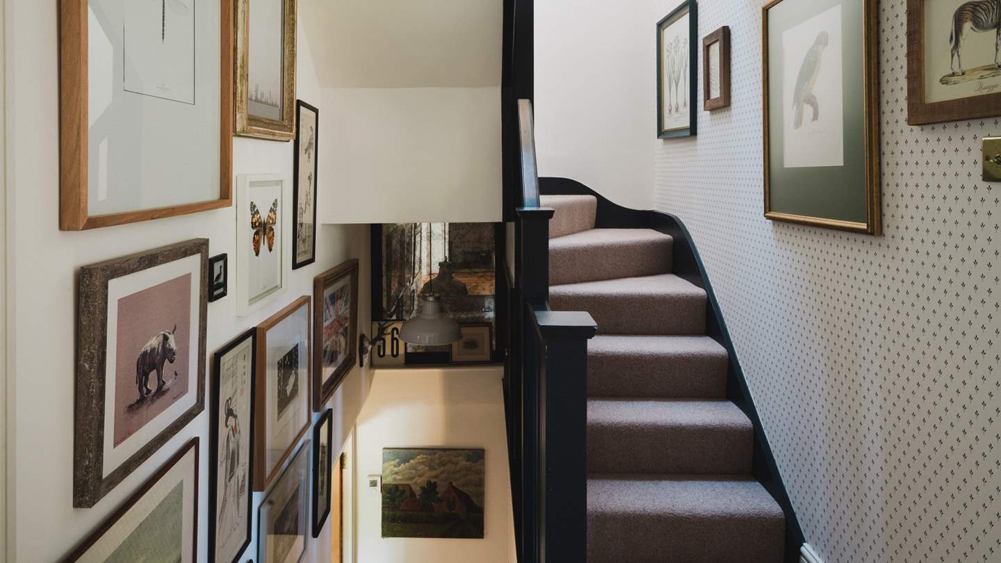 Tucked in the eaves of the top floor, the third and fourth bedrooms await