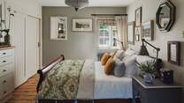 Four beautifully dressed bedrooms offer flexible accommodation for six