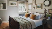 The first bedroom invites soothing slumber