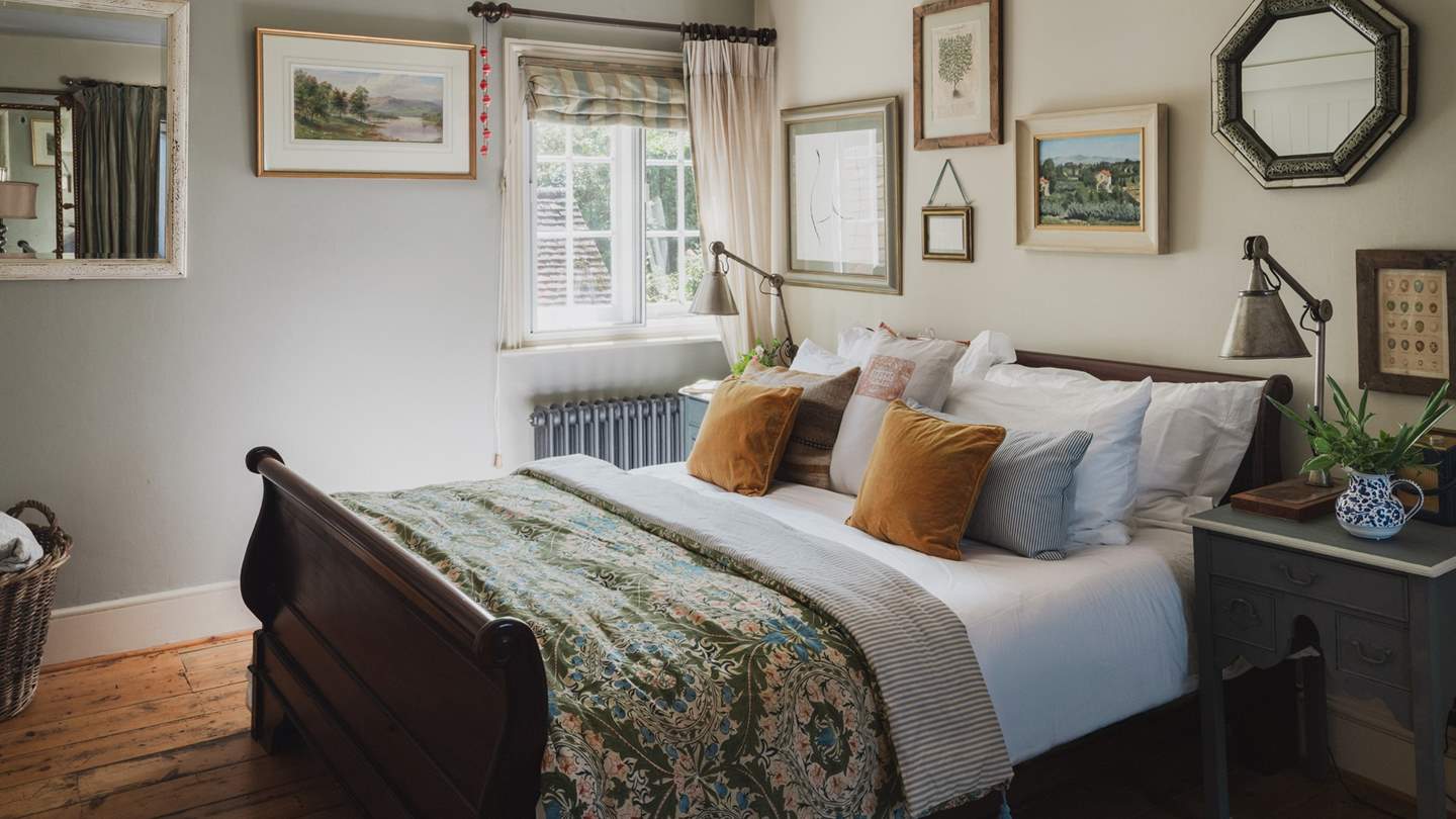 The first bedroom invites soothing slumber