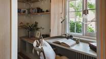 A downstairs study beckons with a dreamy outlook