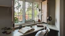 Offering an idyllic light-filled space to focus or gather some quiet time