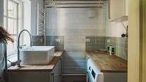 In a separate utility room, a washing machine awaits, with the addition of an indoor kitchen maid, and an outdoor washing line for air-drying laundry