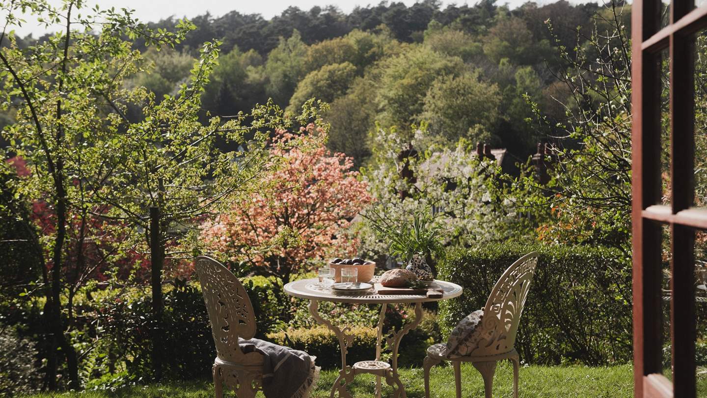 A world of enchantment awaits in the sun-dappled garden