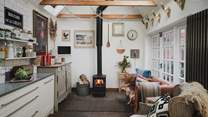The cosiest scenes unfold in the cooler months, with a discreet Smart TV offering effortless unwinding