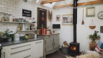 The sweetest spot to reside as dinner preparations take place, you’ll also find a relaxed seating area within the kitchen