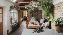Bathed in natural light, the kitchen and dining spaces have been thoughtfully designed to create a harmonious area for cooking, dining and socialising