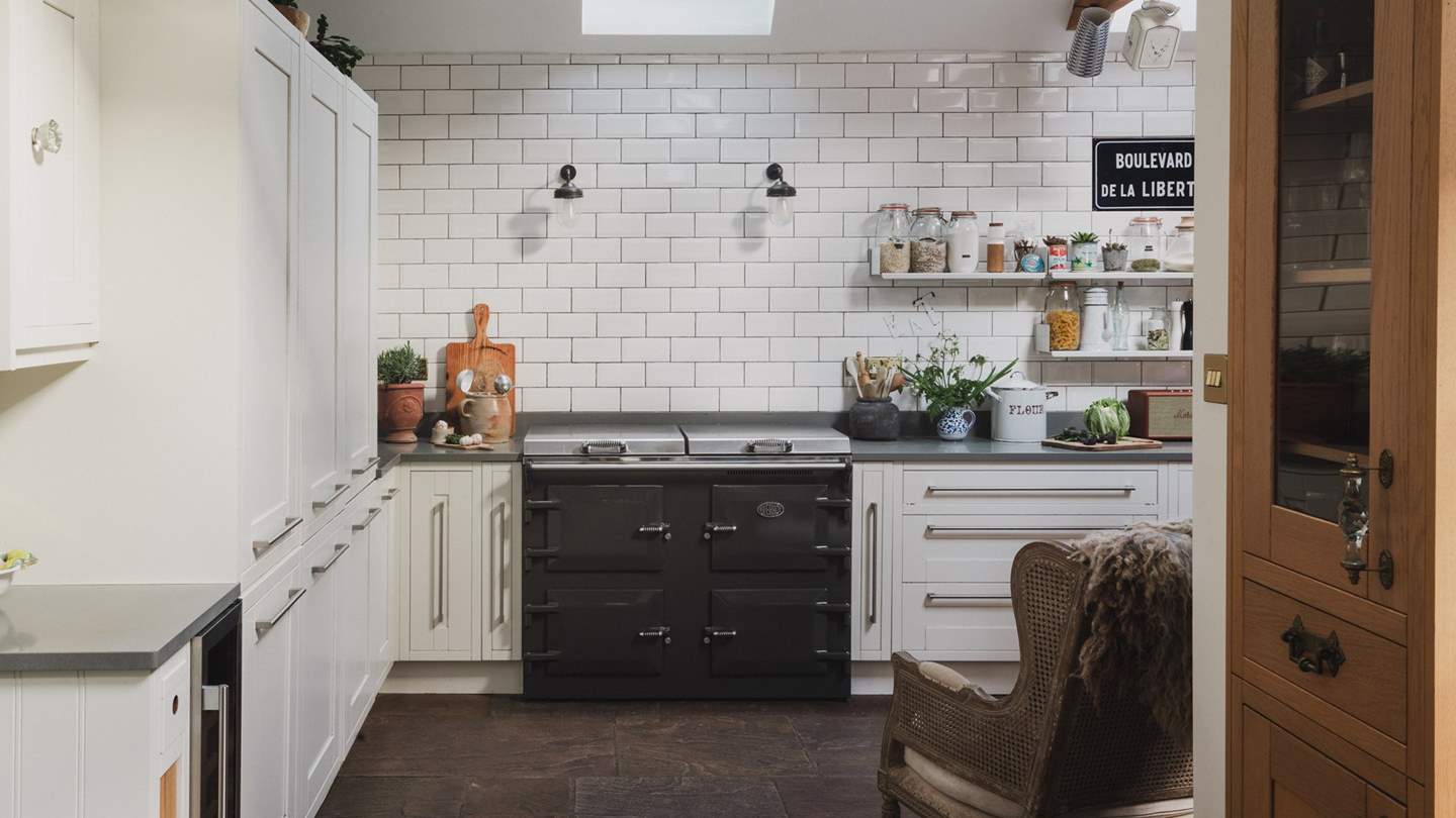 Beyond the dining space, uncover the well-equipped kitchen