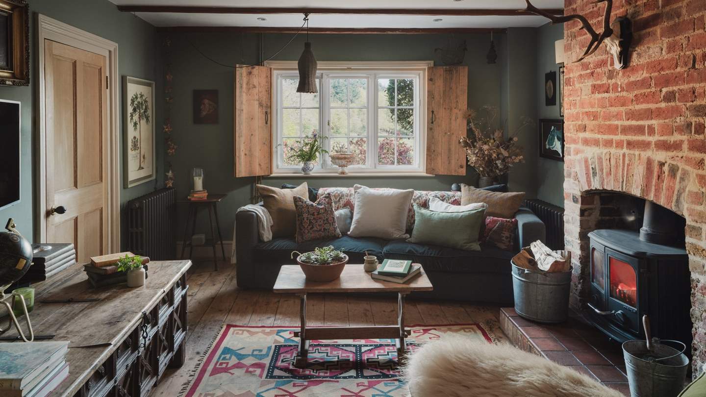 A cosy and well-proportioned room to unwind, the living area is a picture of fairytale charm