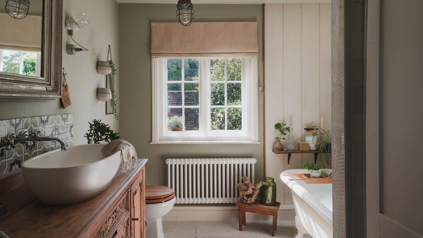 Underfloor heating and a heated towel rail add a touch of warmth to morning showers and indulgent, bubble-topped soaks