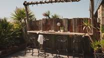 Raised seating offers a dream setting for cocktails at sunset