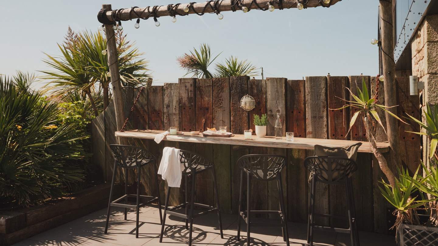 Raised seating offers a dream setting for cocktails at sunset