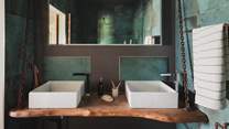 Discover dual sinks in the ensuite shower room