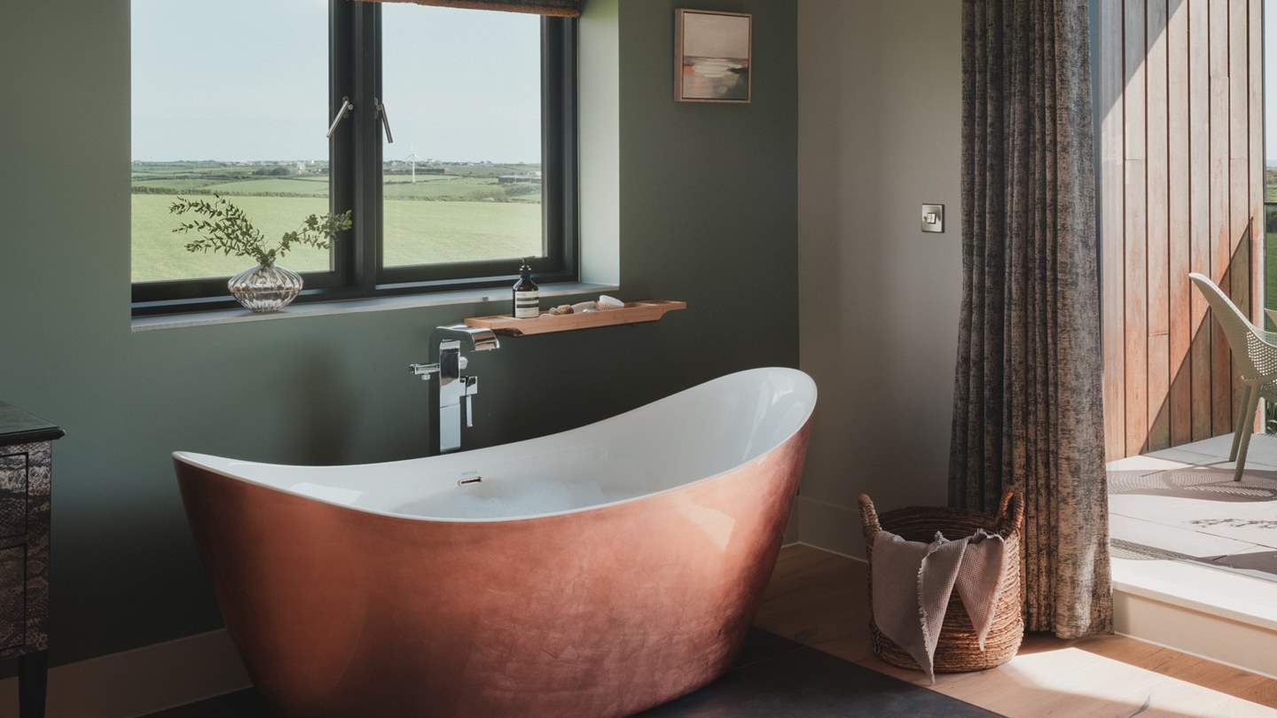 Savour soothing dips in the copper bathtub