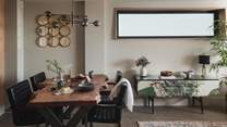 Take a seat at the striking handmade dining table 