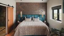 Dual aspect windows draw your gaze to the bewitching views beyond