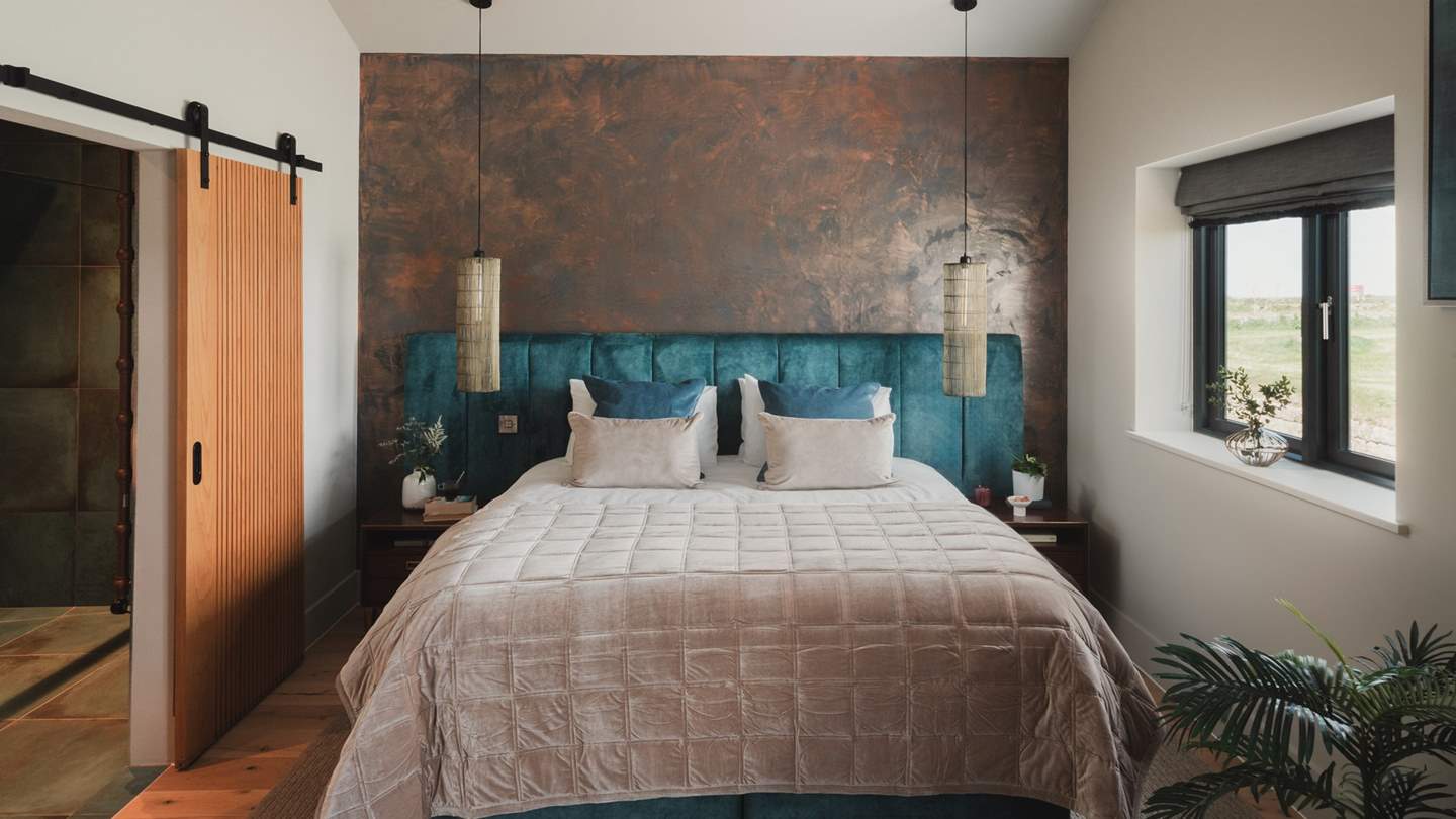 Dual aspect windows draw your gaze to the bewitching views beyond