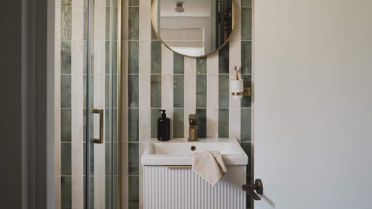 A rainfall shower and heated towel rail promise the utmost comfort